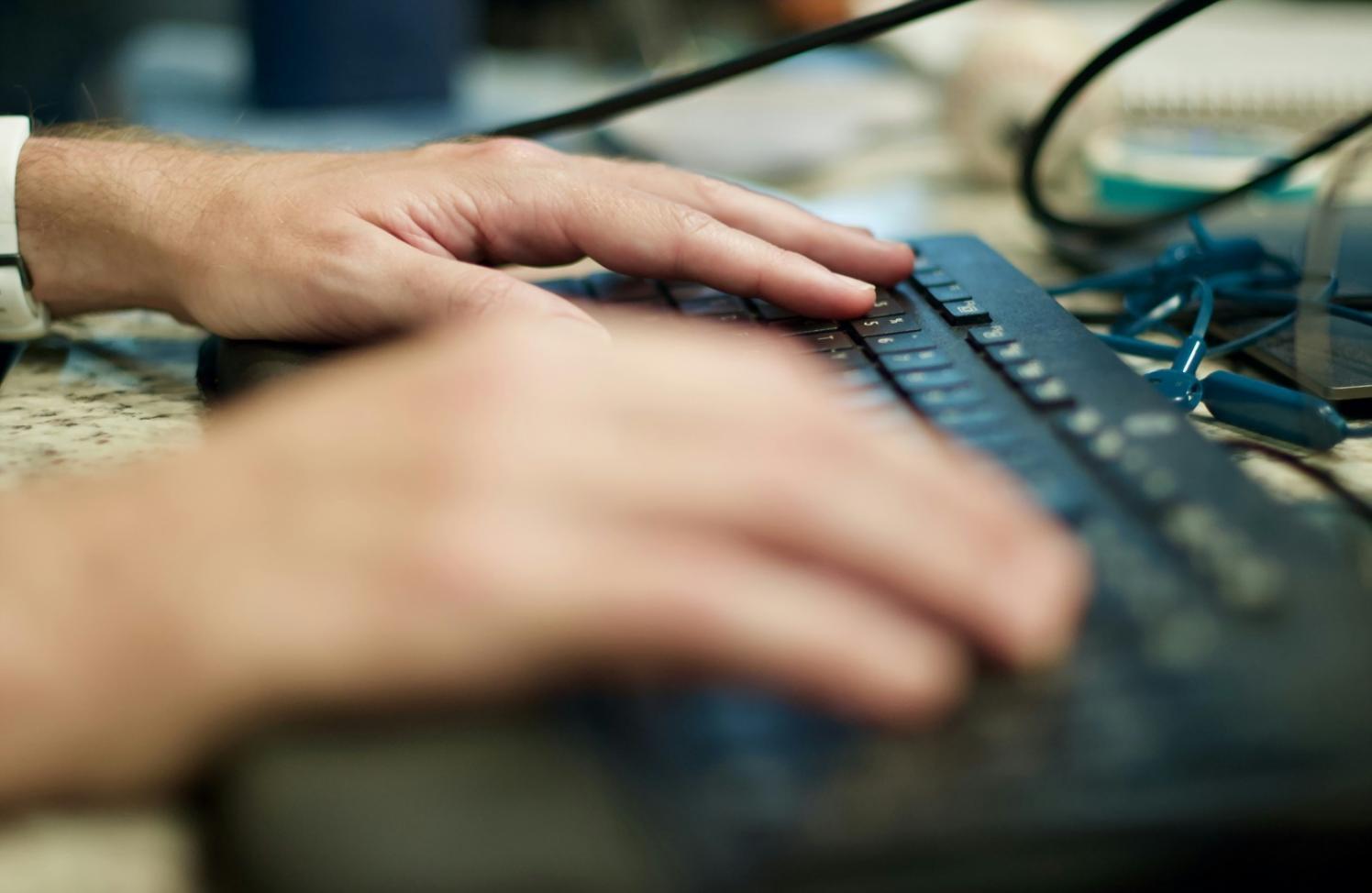 Cybersecurity professional analyzing code